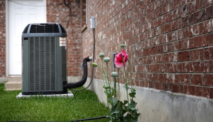 air conditioner in backyard in spring 1