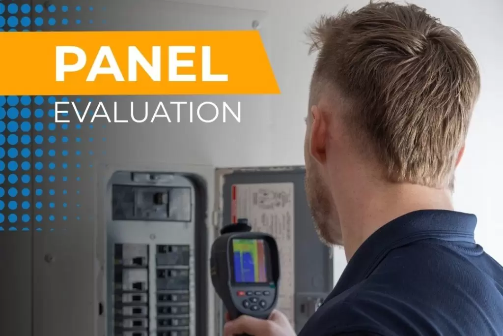 Electrician performing a thermal safety inspection on a circuit breaker panel in Columbia SC